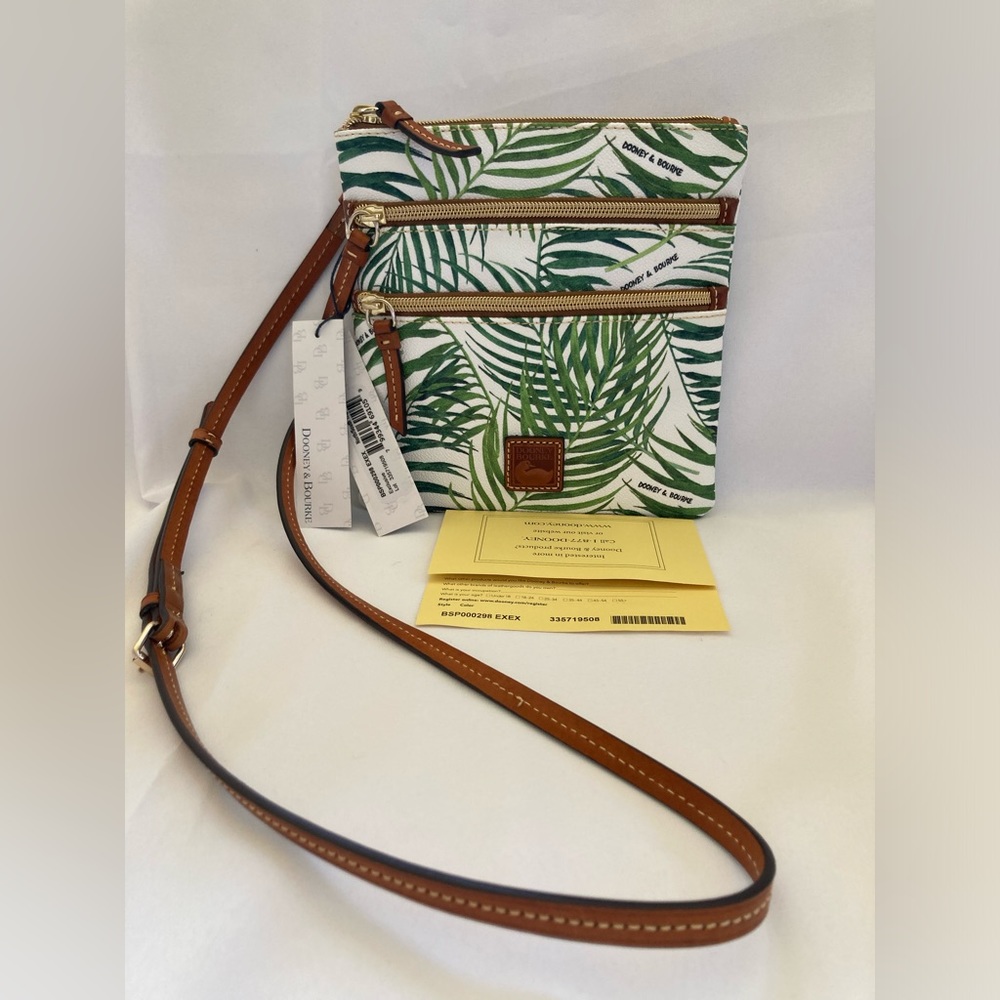 Dooney & Bourke North/South Triple Zip Exclusive. Coated canvas and leather. NWT